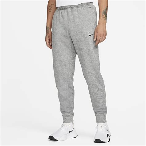 nike trainingsbroek witte streep|Joggingbroeken en trainingsbroeken voor heren .